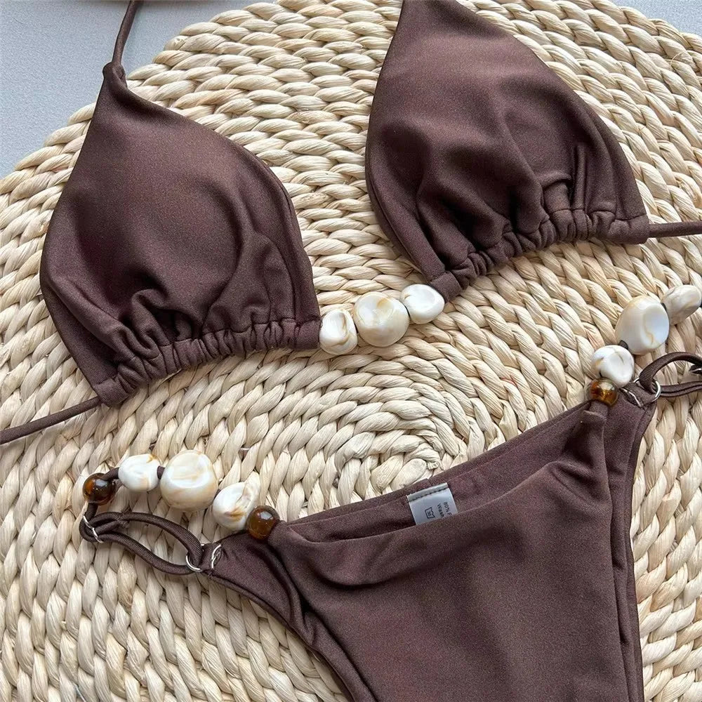 Bikini triangle micro brésilien 2026 — Maillot halter perlé cordon