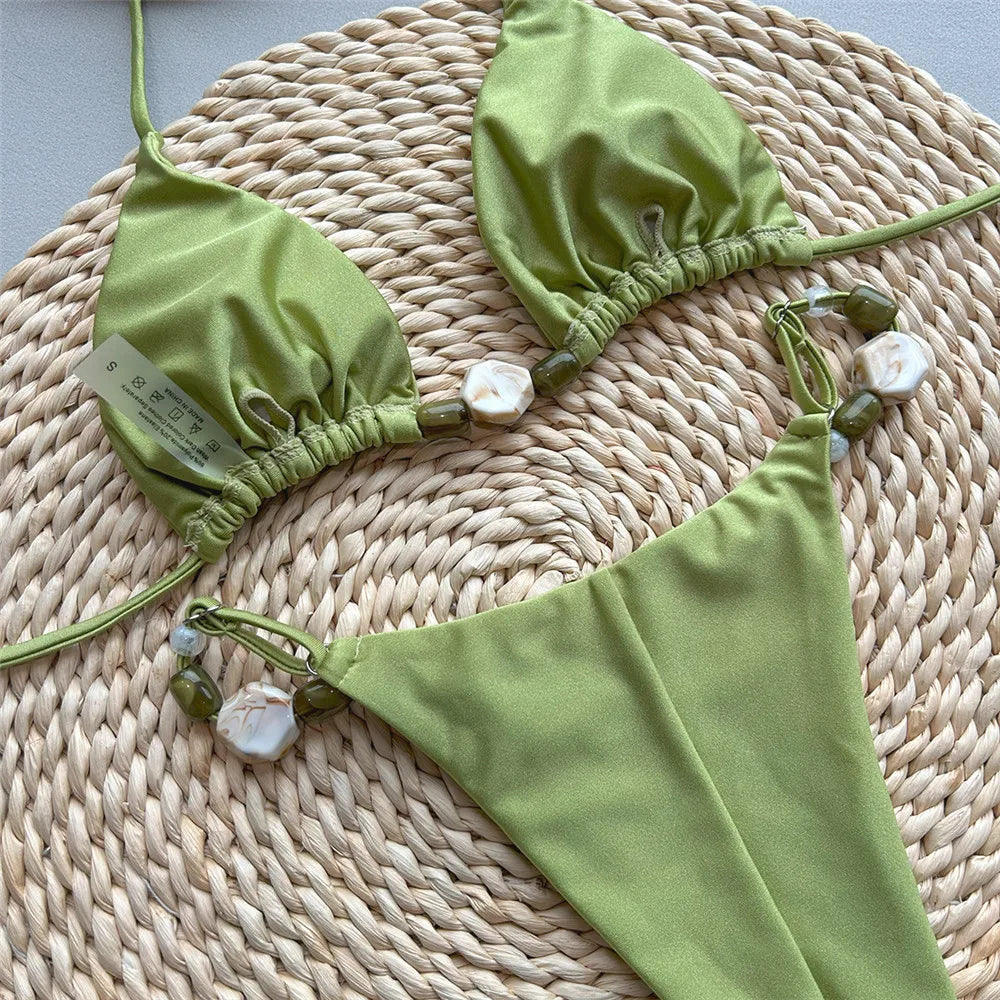 Bikini triangle micro brésilien 2026 — Maillot halter perlé cordon