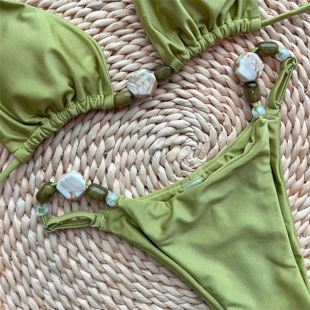 Bikini triangle micro brésilien 2026 — Maillot halter perlé cordon